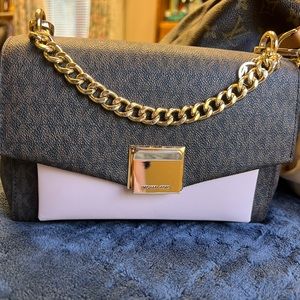 Michael Kors crossbody bag. Brown and pink color.